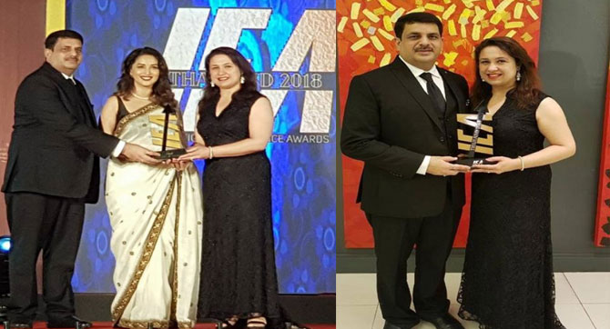 IVF Specialist Anjali Chaudhary Receiving Award from Madhuri Dixit